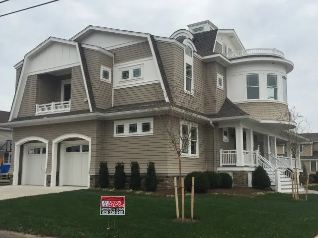 Slide of Action Creations Roofing & Siding