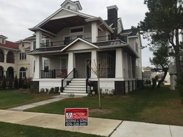 Slide of Action Creations Roofing & Siding