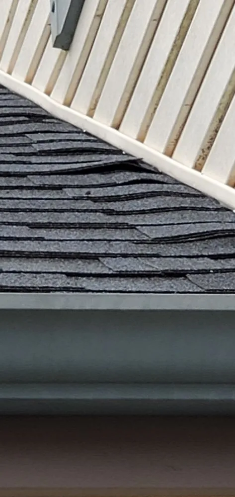 Slide of Action Creations Roofing & Siding