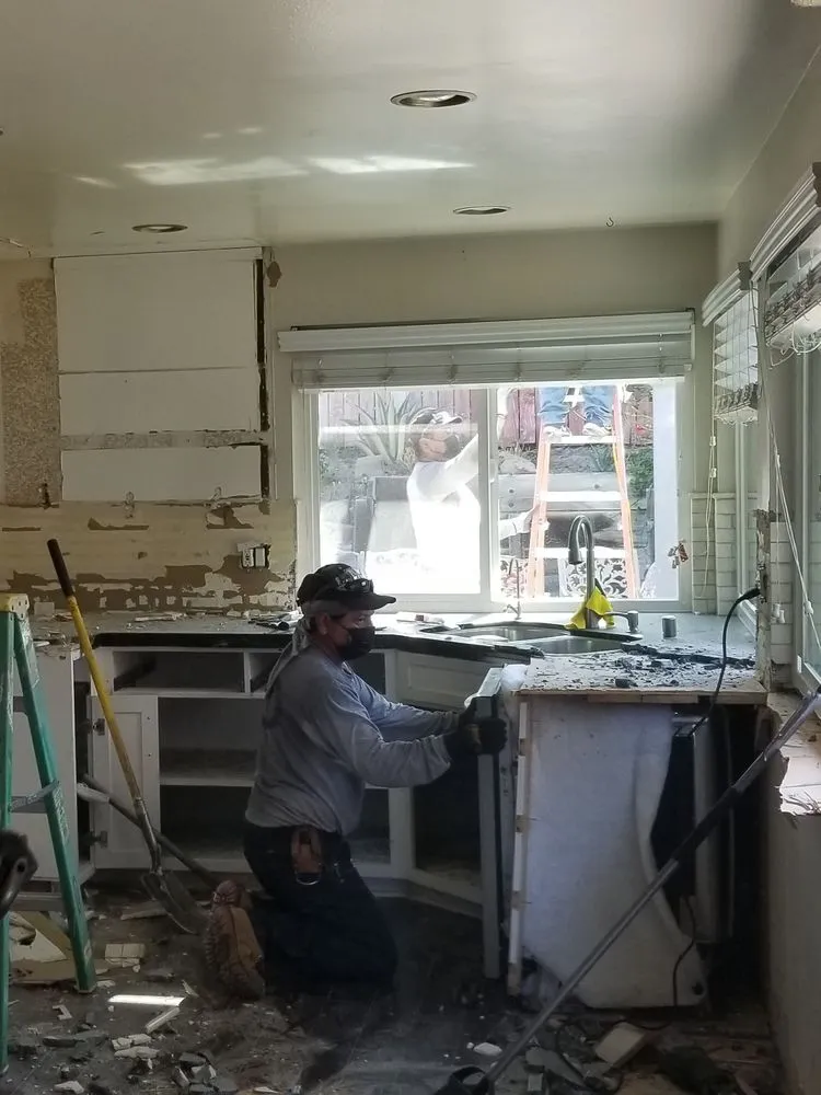 Emergency flat roof repair experts serving San Fernando Valley, CA - Action Hauling