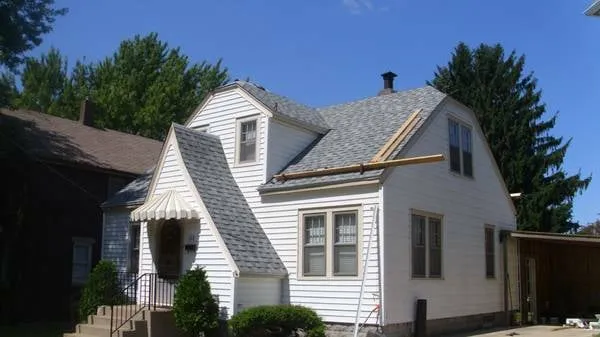 Slide of Action R&C Roofing