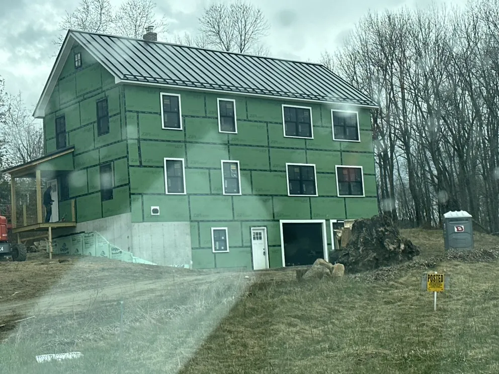 Slide of Action Roofing & Construction