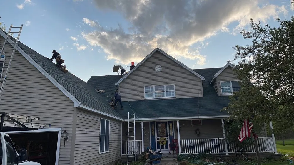 Slide of Action Roofing & Construction