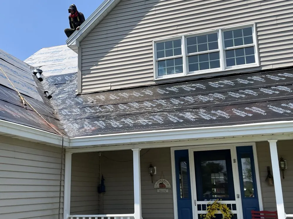 Slide of Action Roofing & Construction