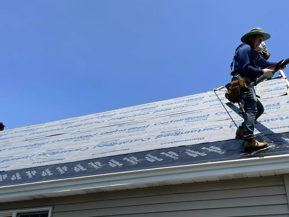 Slide of Action Roofing & Construction