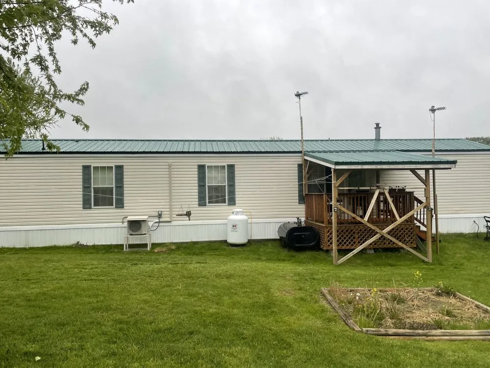 Slide of Action Roofing & Construction