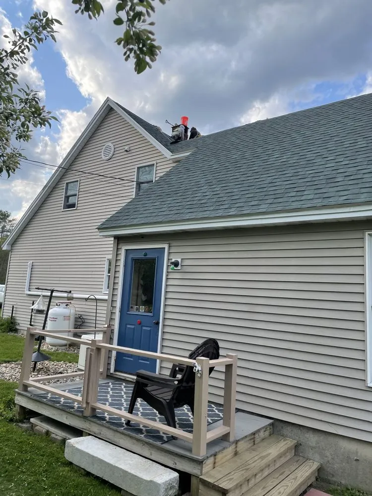 Slide of Action Roofing & Construction