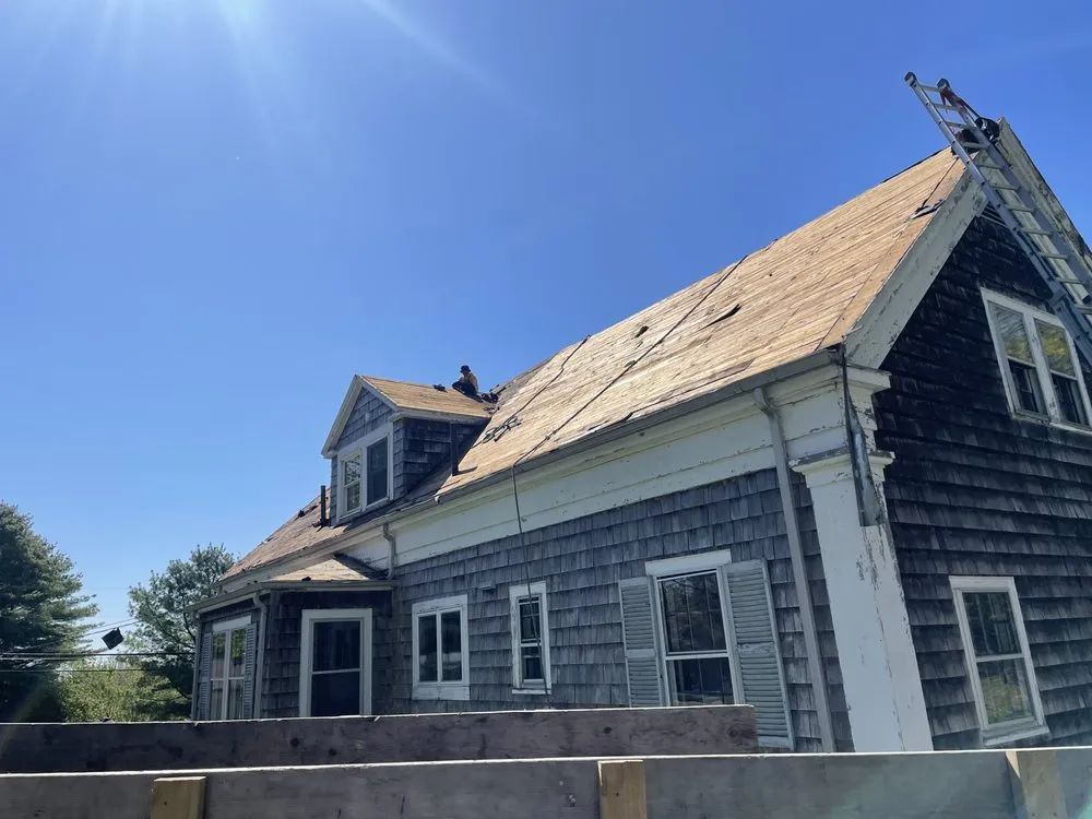 Slide of Action Roofing & Construction