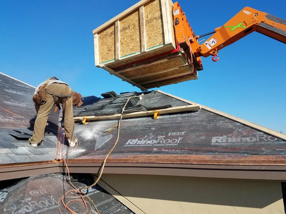 Slide of Action Roofing & Construction