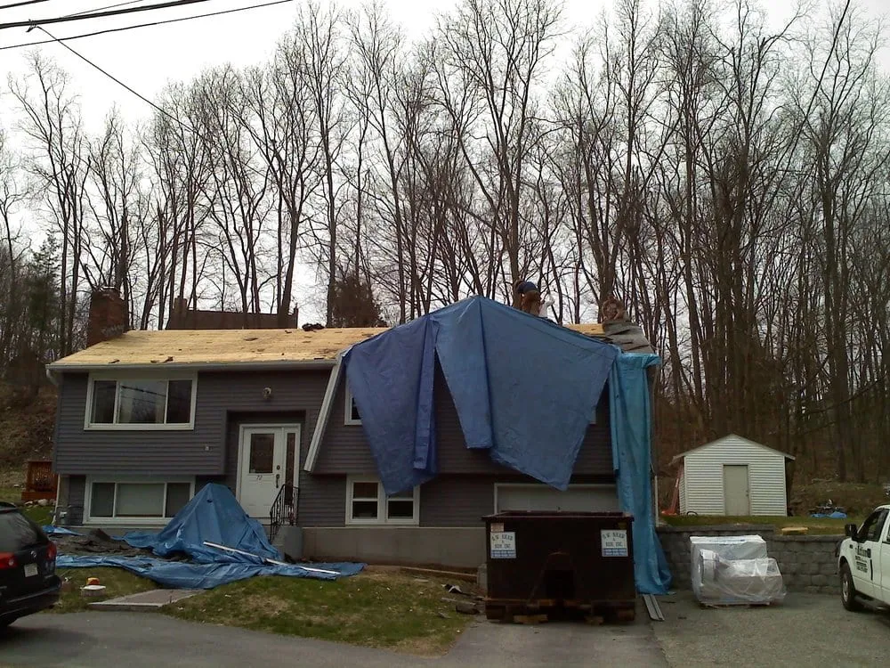 Slide of Action Roofing & Construction