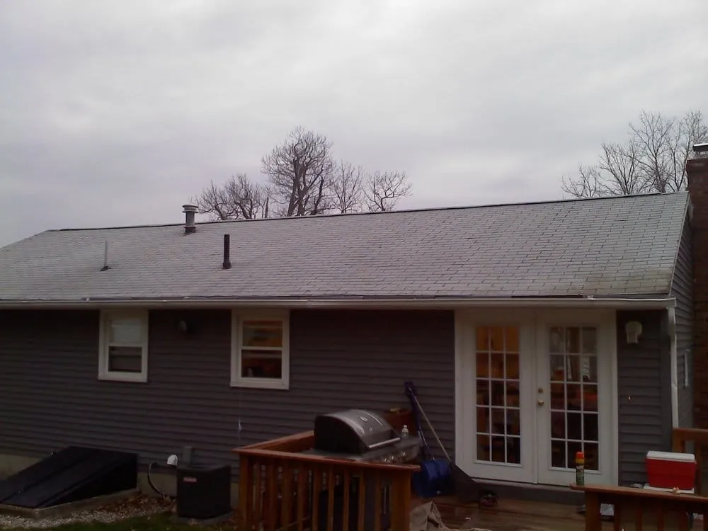 Slide of Action Roofing & Construction