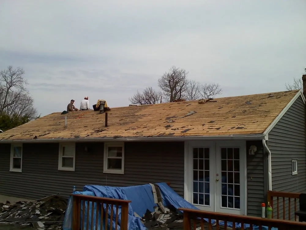 Slide of Action Roofing & Construction