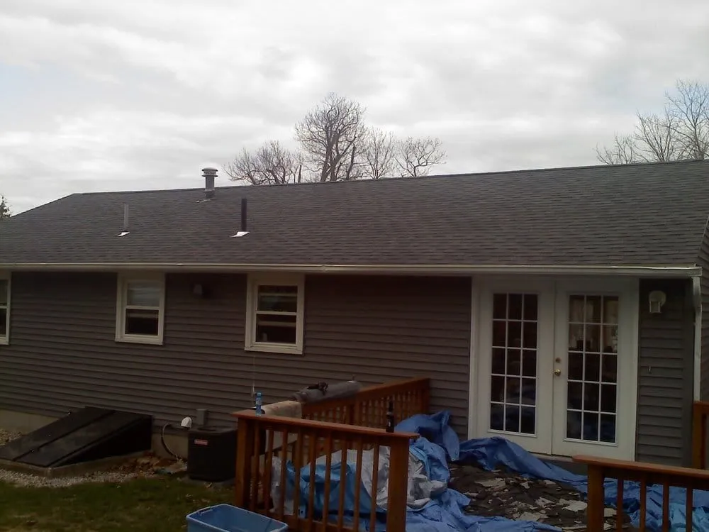 Slide of Action Roofing & Construction