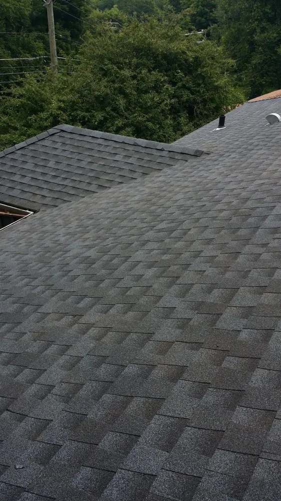 Slide of Action Roofing & Home Solutions