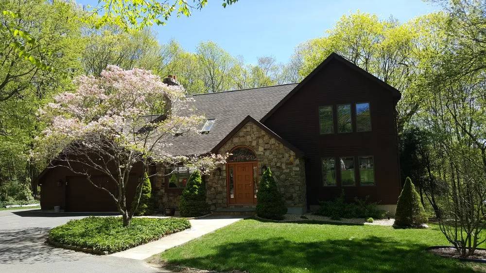 Slide of Action Roofing & Home Solutions