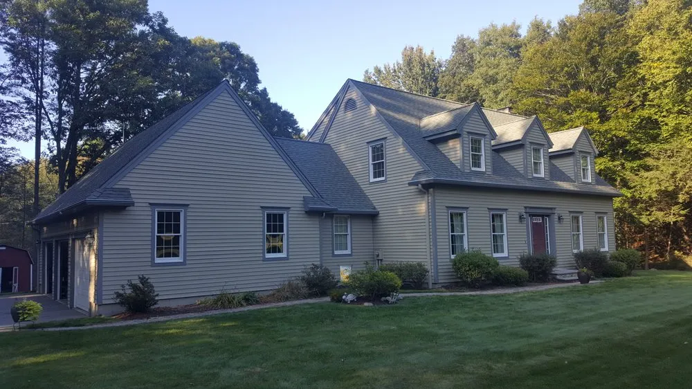 Slide of Action Roofing & Home Solutions