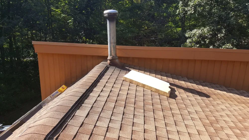 Slide of Action Roofing & Home Solutions