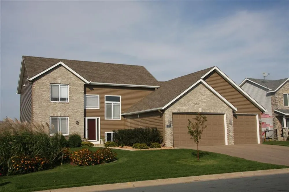 Slide of Action Roofing & Siding