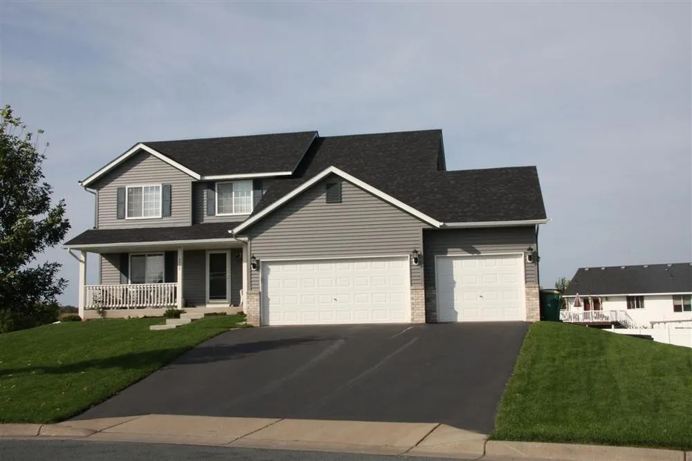 Slide of Action Roofing & Siding