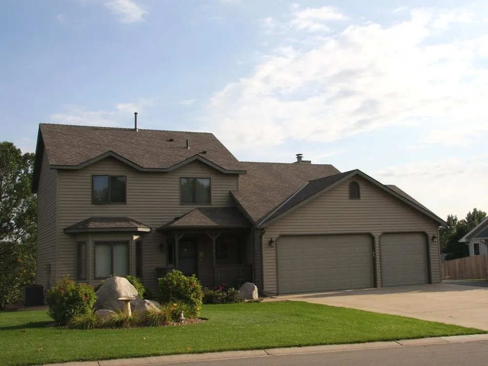 Slide of Action Roofing & Siding