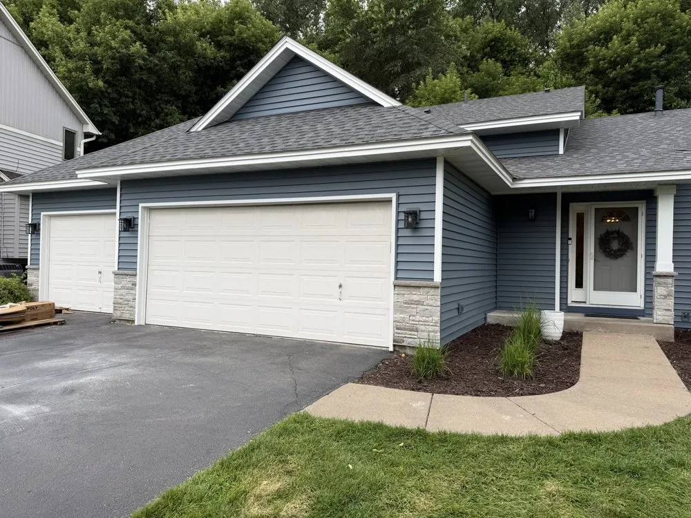 Slide of Action Roofing & Siding