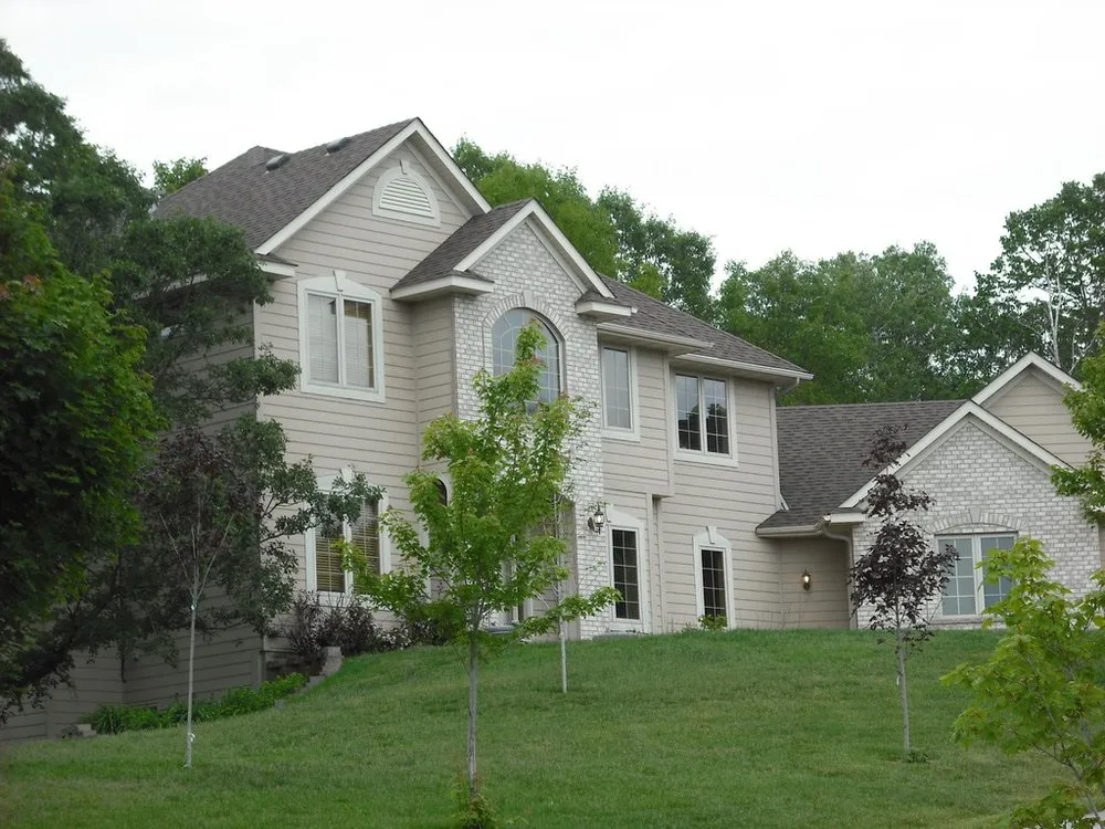 Slide of Action Roofing & Siding