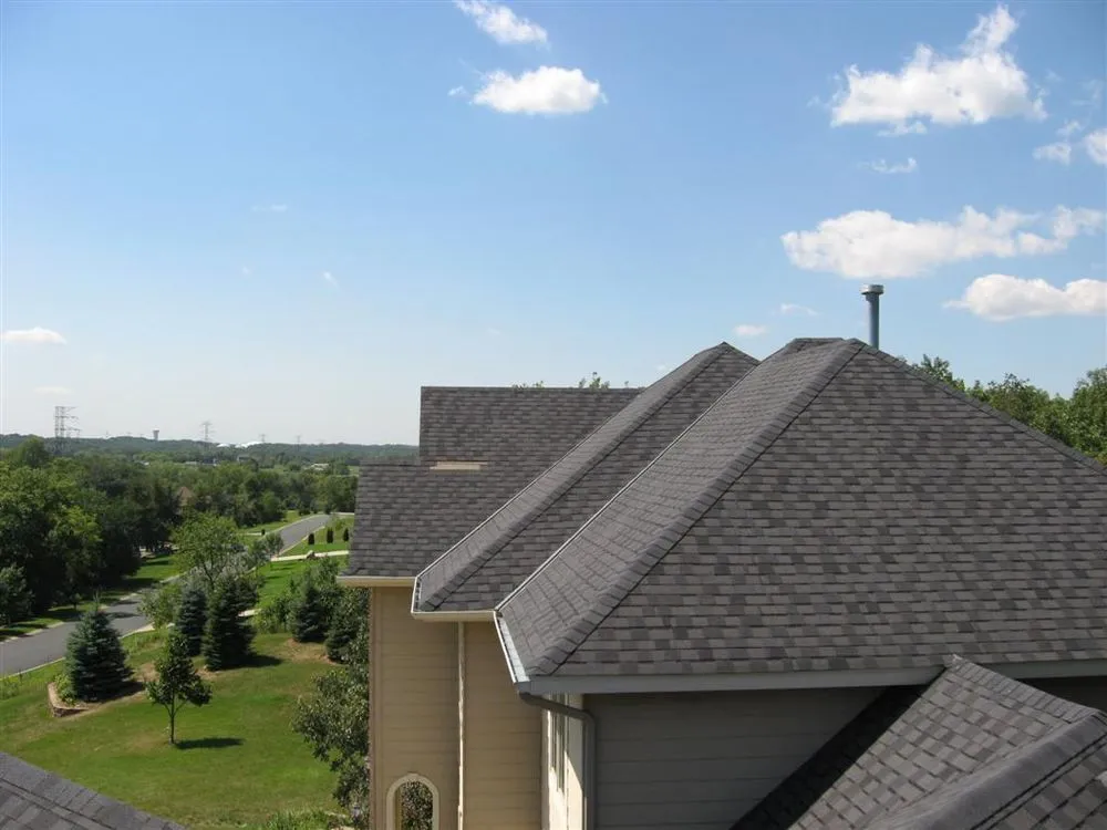 Slide of Action Roofing & Siding