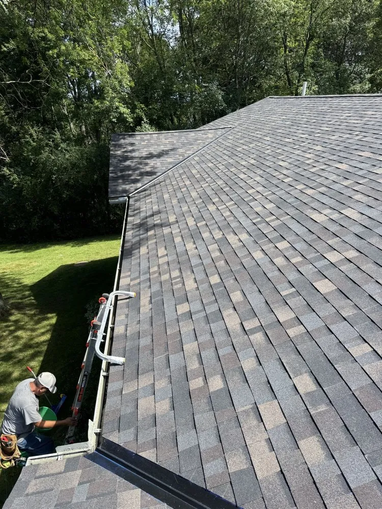 Slide of Action Roofing & Siding