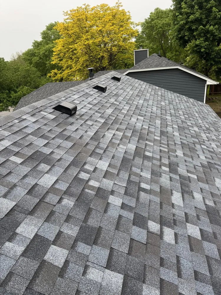 Slide of Action Roofing & Siding