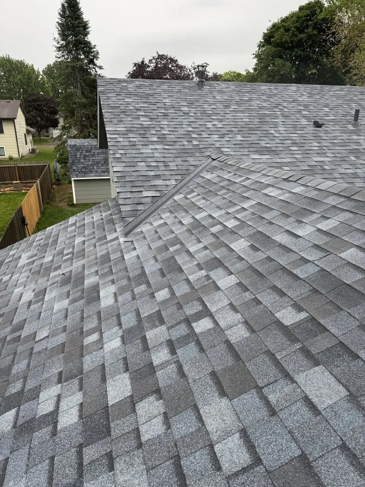 Slide of Action Roofing & Siding