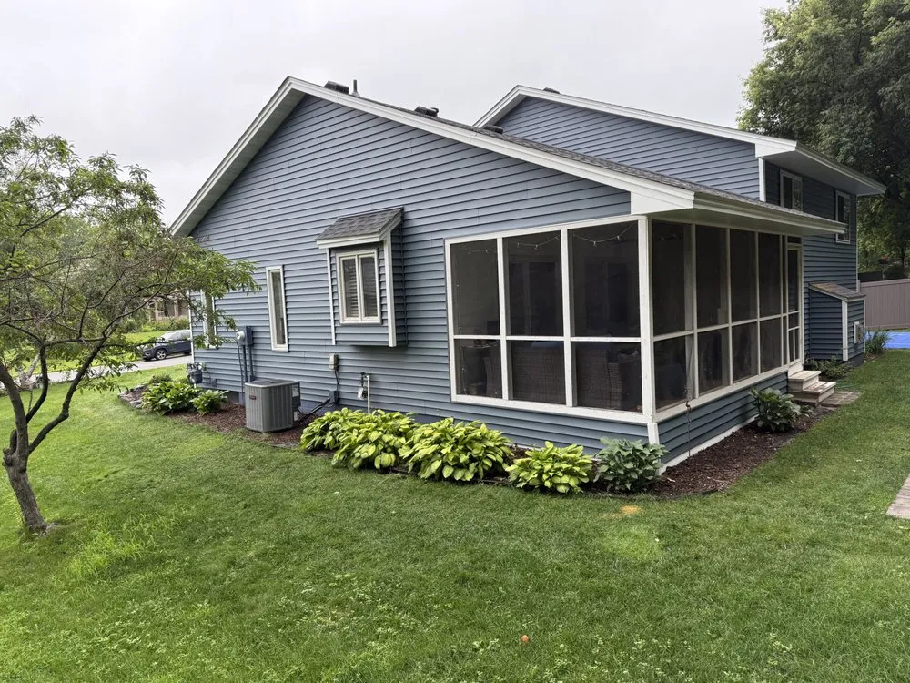 Slide of Action Roofing & Siding