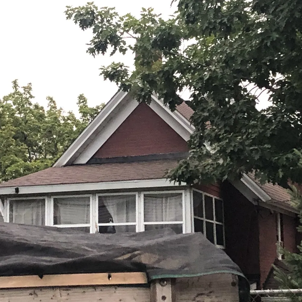 Slide of Action Roofing & Siding