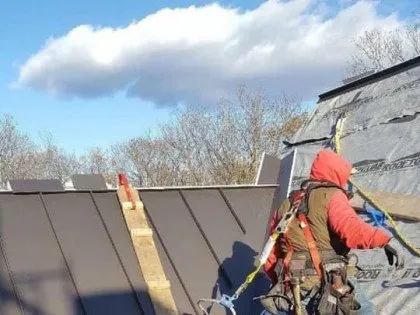 Slide of Action Roofing and Restoration