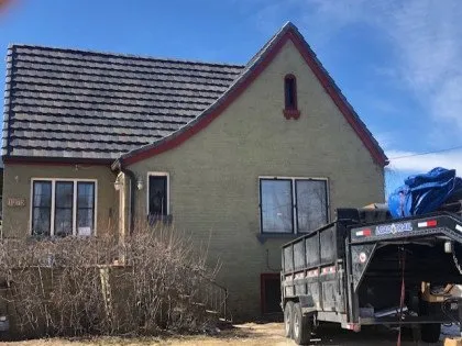 Slide of Action Roofing and Restoration