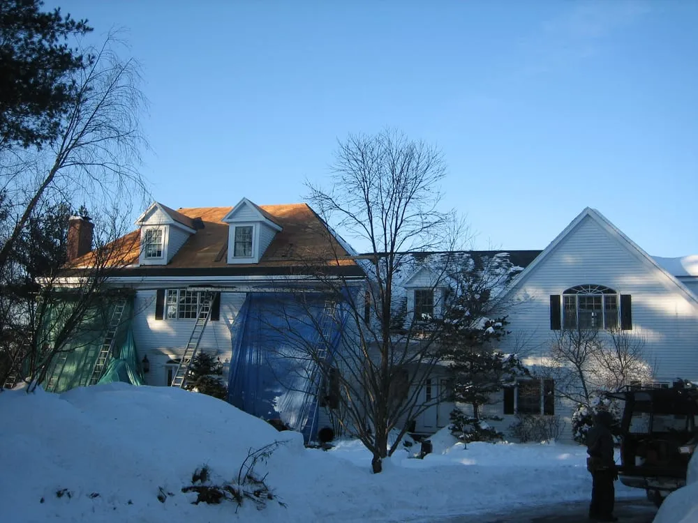 Slide of Action Roofing