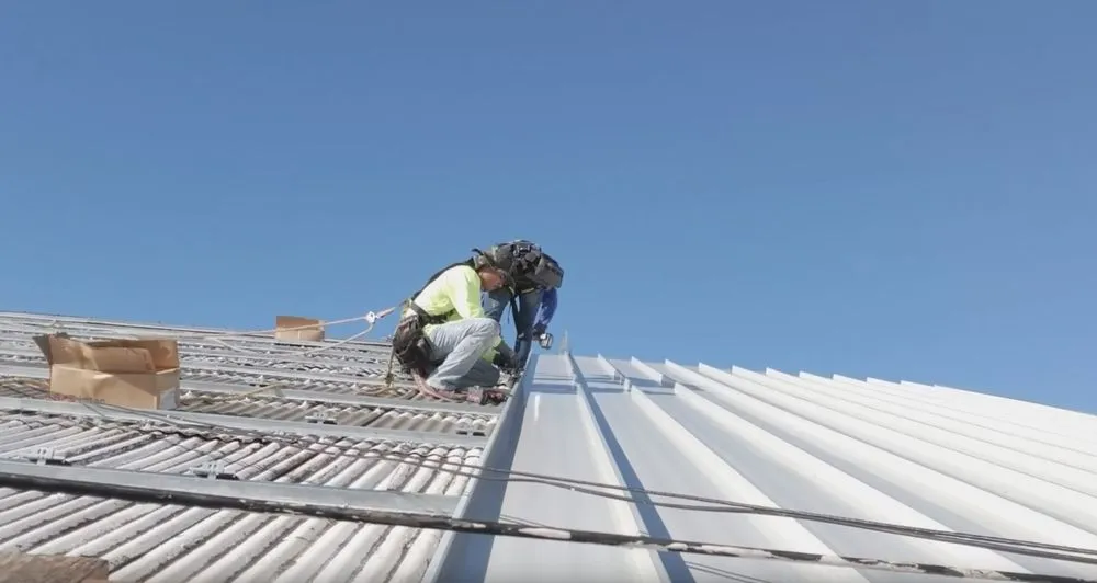 Slide of Action Roofing Hawaii