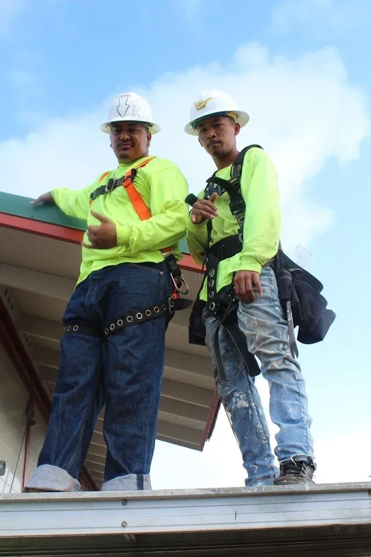 Slide of Action Roofing Hawaii