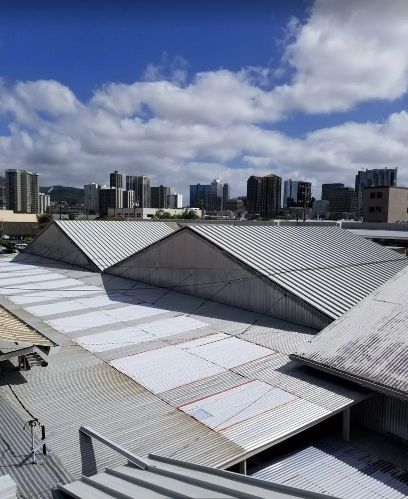 Slide of Action Roofing Hawaii