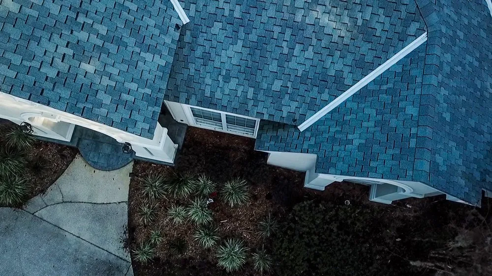 Slide of Action Roofing