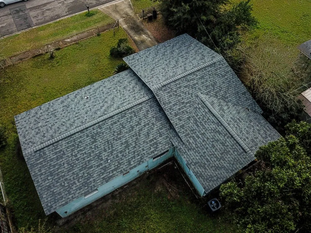 Slide of Action Roofing