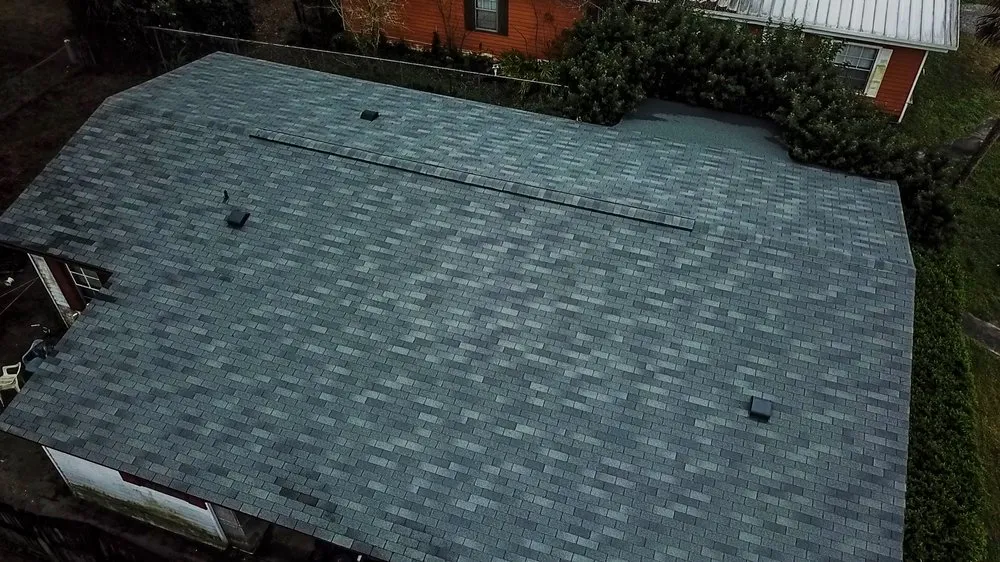 Slide of Action Roofing