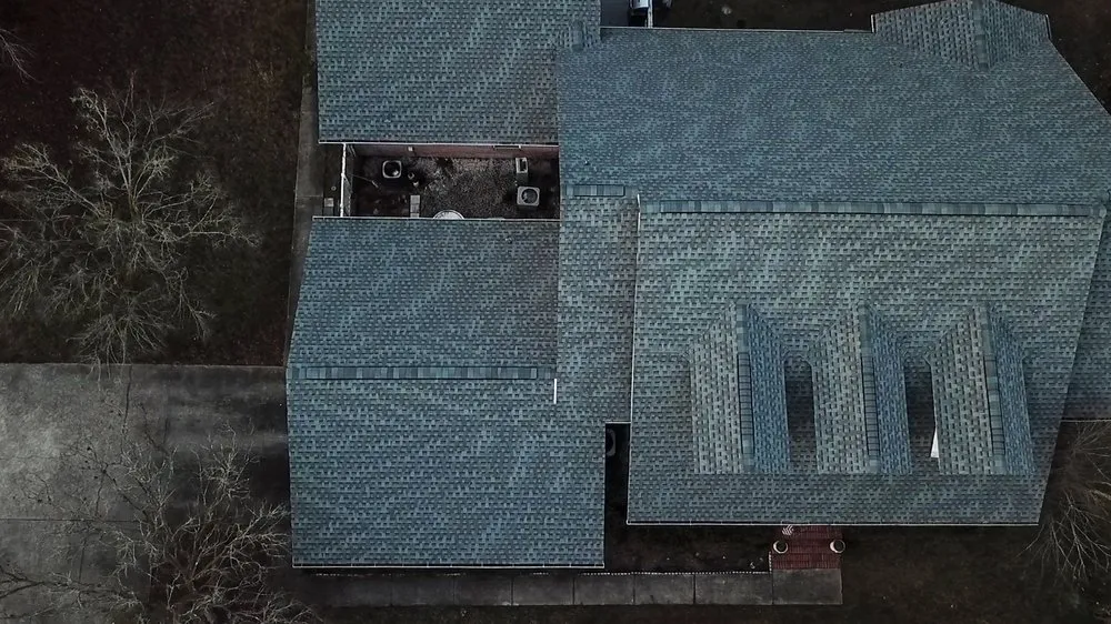 Slide of Action Roofing