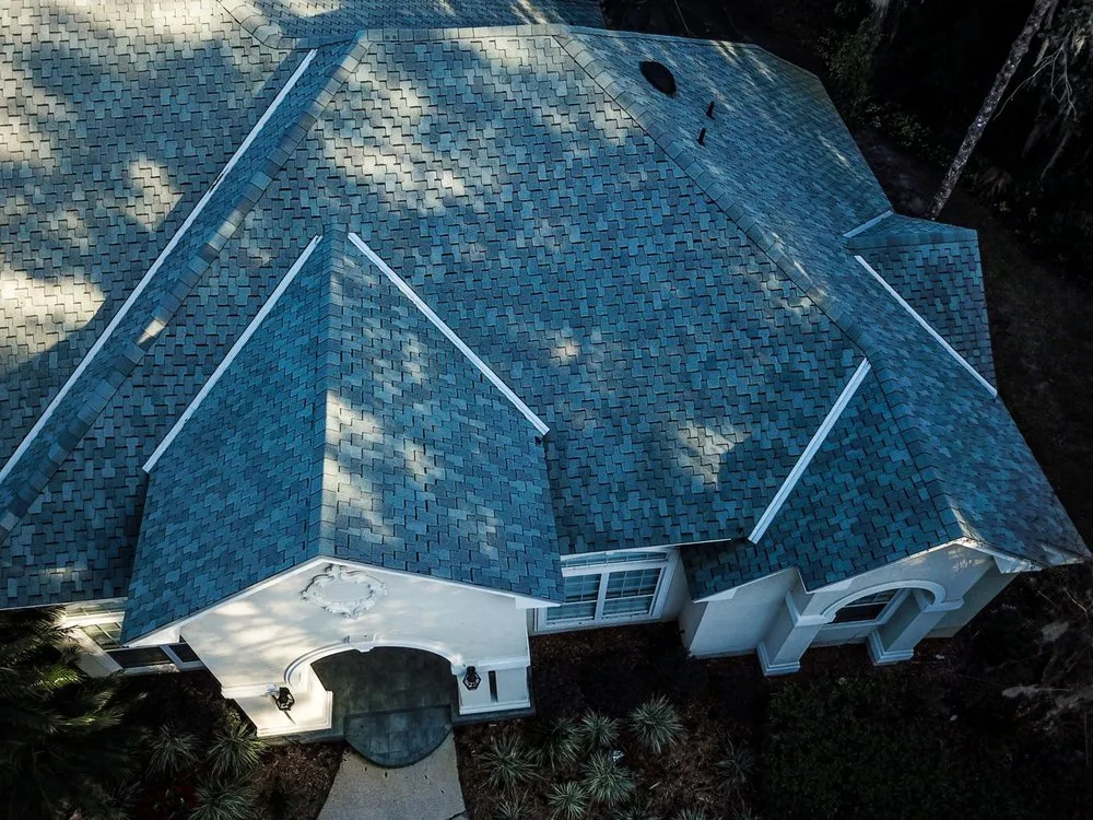 Slide of Action Roofing