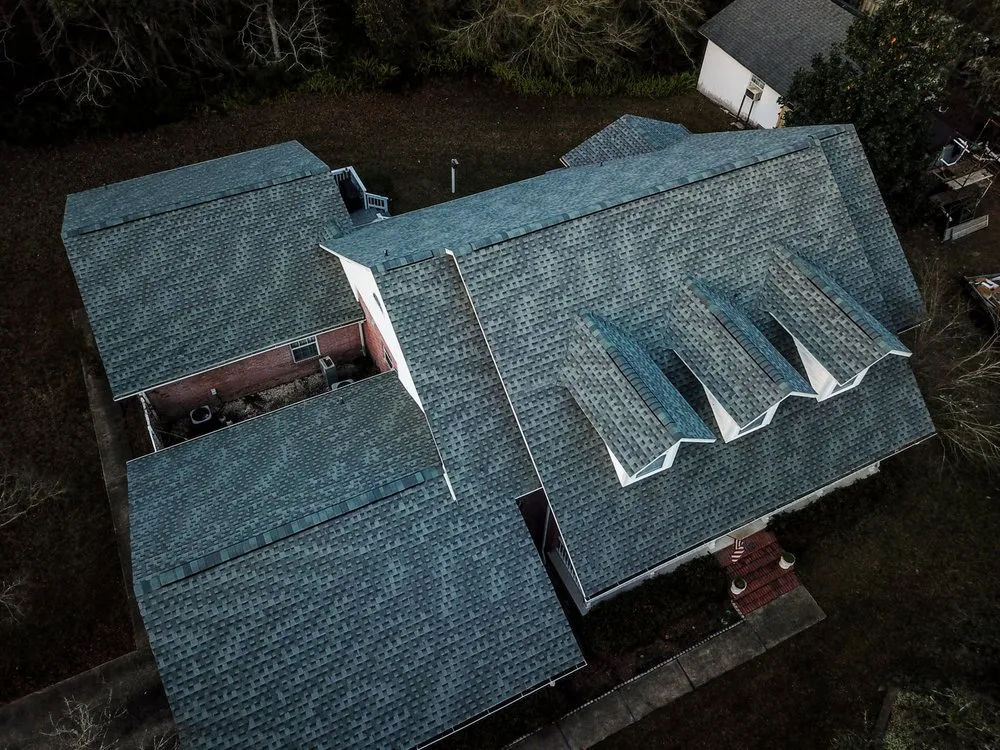 Slide of Action Roofing