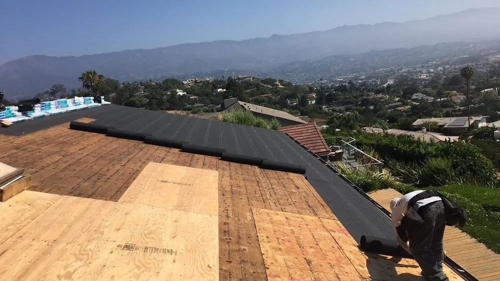 Slide of Action Roofing