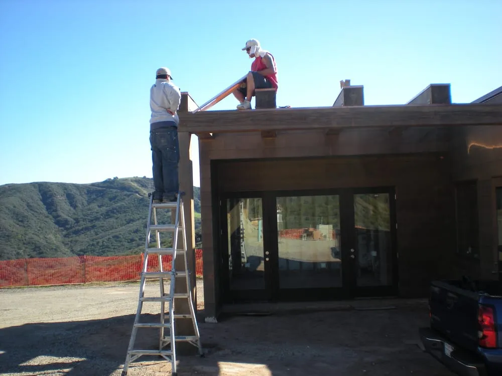 Slide of Action Roofing