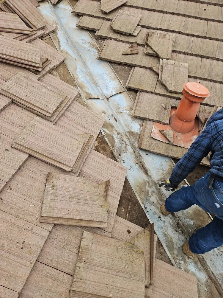 Slide of Action Roofing Service