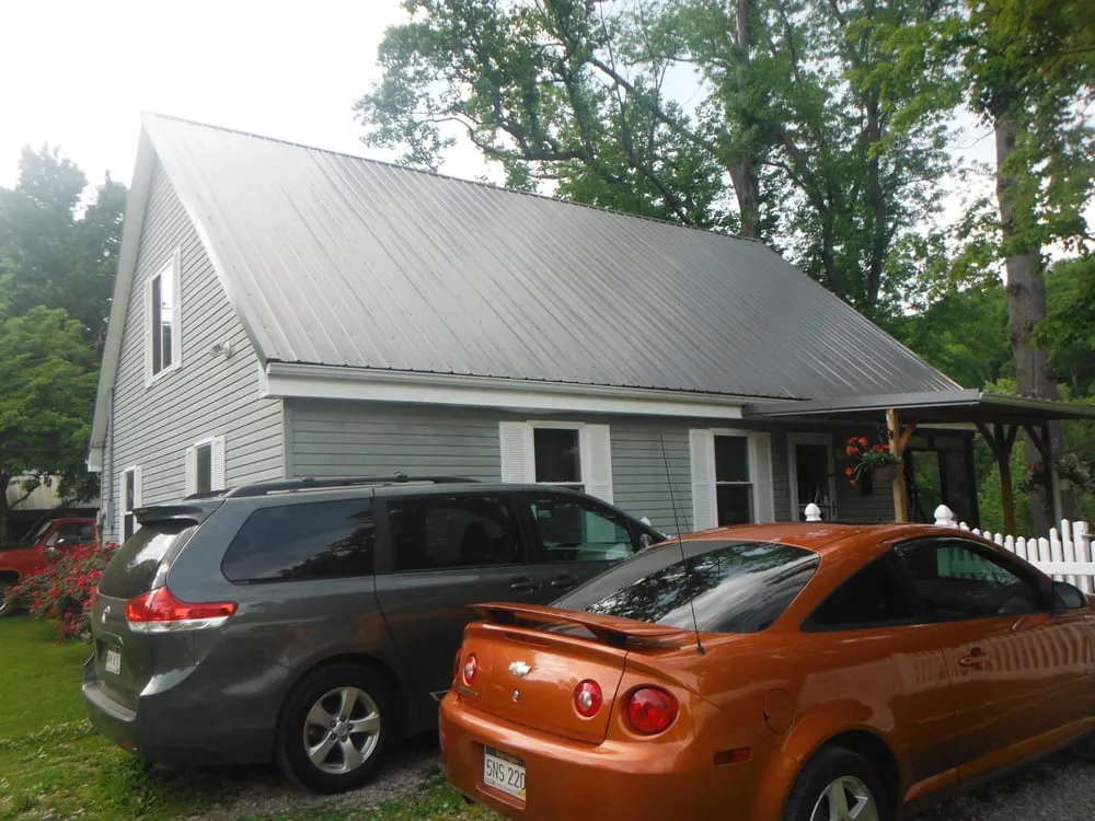 Licensed flat roof repair experts serving Walker, WV - Action Roofing