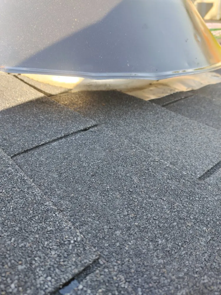 Slide of Action Roofing