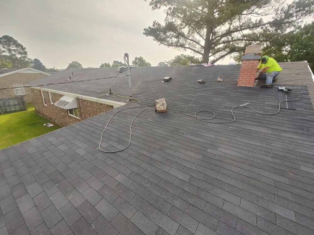 Slide of Action Roofing